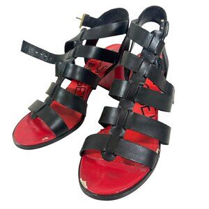 Killer Red soles, chunky heels and black straps sandals by brand Kelsi Dagger